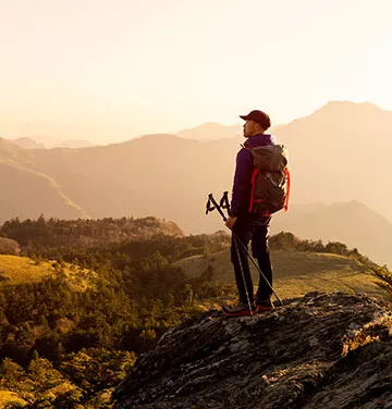 Virtual office at One World Trade Center, New York, client enjoys hiking, knowing an onsite team is handling the business.